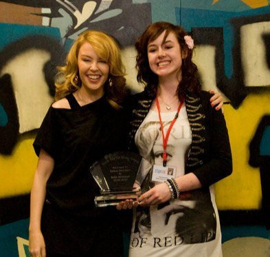 Emma receives Award from Kylie Minogue